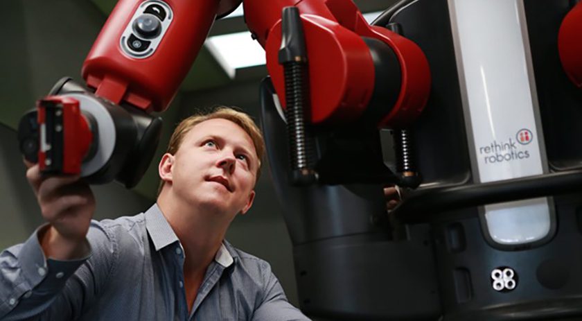 Convergence Medical Founder and CEO Chris Jeffery and the V01 robotic platform.